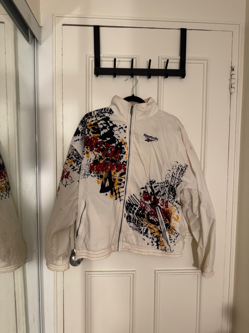 VINTAGE Reebok Jacket with Red and Blue Logo